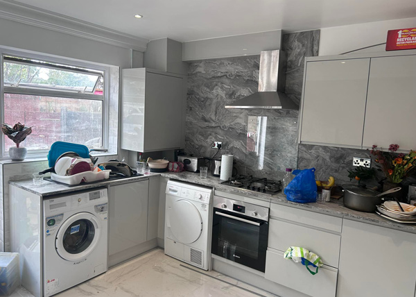 modern kitchen with appliances and dishes for washing efficient layout utilizing space with six containers and dishes